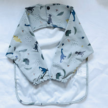 Load image into Gallery viewer, BRAELON BIB/ SMOCK (DINOSAUR BLUE)
