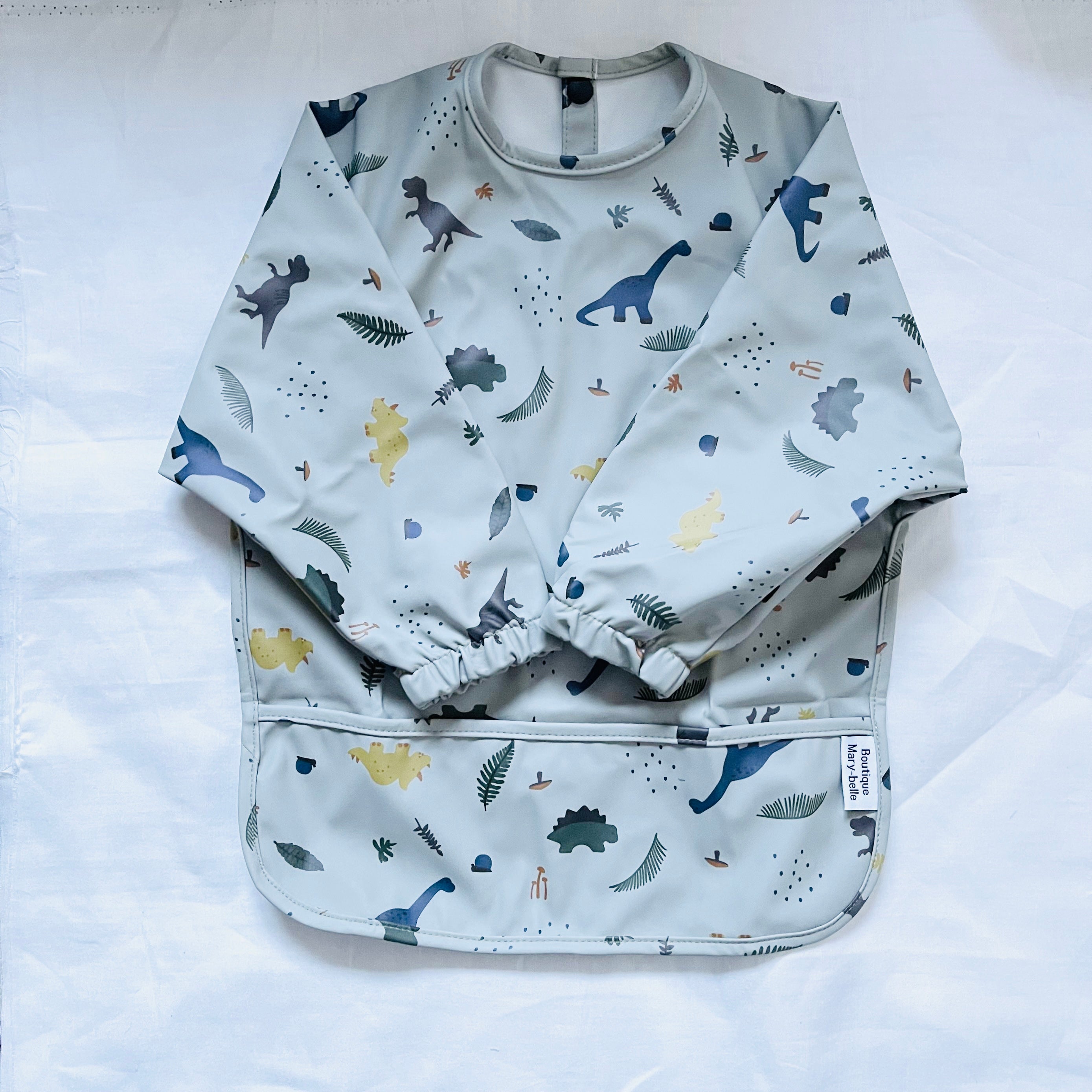 BRAELON BIB/ SMOCK (DINOSAUR BLUE)